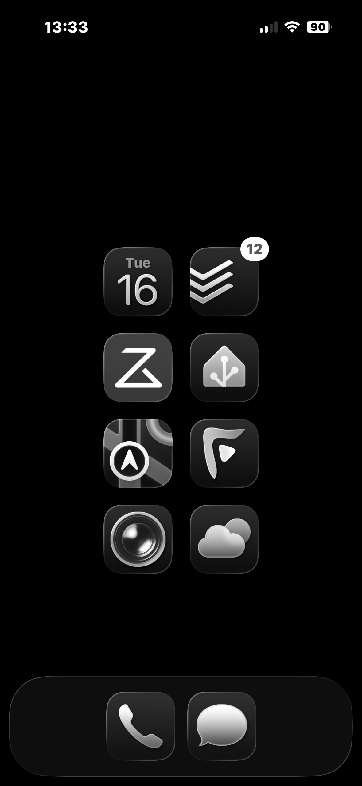 My current black and white, minimal iPhone home screen.